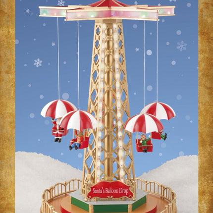 Koopman - LED beleuchtetes Weihnachtsdorf Parachute Ballon Drop Karussell mit Musik und Bewegung 48,5cm