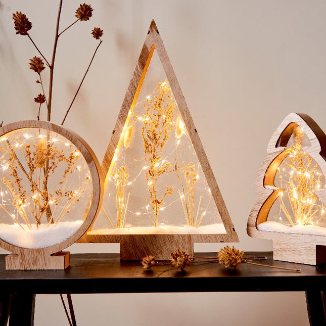 Vorschaubild von 3 LED Leuchtobjekten aus braunem Holz mit Schnee und Trockenblumen im Inneren