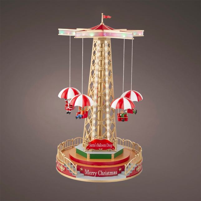 Koopman - LED beleuchtetes Weihnachtsdorf Parachute Ballon Drop Karussell mit Musik und Bewegung 48,5cm