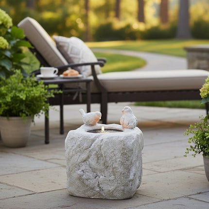 DekoSturm grey polyresin garden fountain with two birds, LED solar light, and water feature.